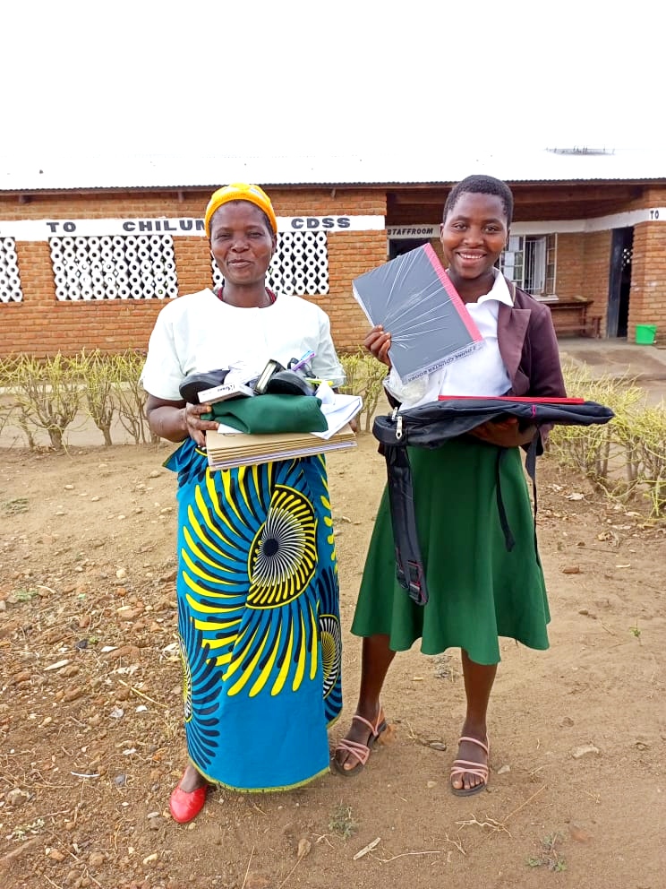 Elefence High School scholarship winner and mother in Malawi Africa